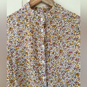 Floral long sleeved button up blouse
